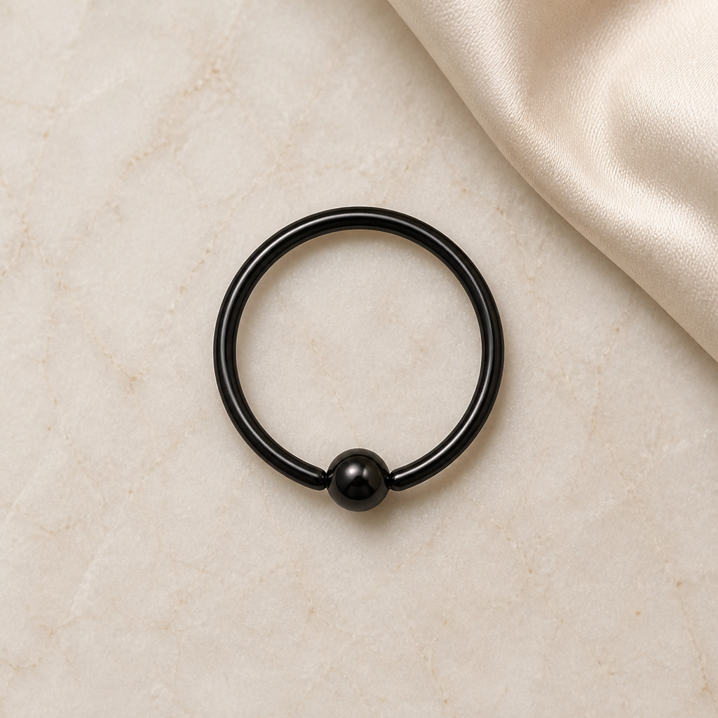 [TOPOSH-LEGACY-LAYOUT-REPAIR-20260717-LEGACY15:TP-BCR-BK-20G8-T2-PLN-056:06] Titanium Captive Bead Ring – Black | 06_accessory_flatlay