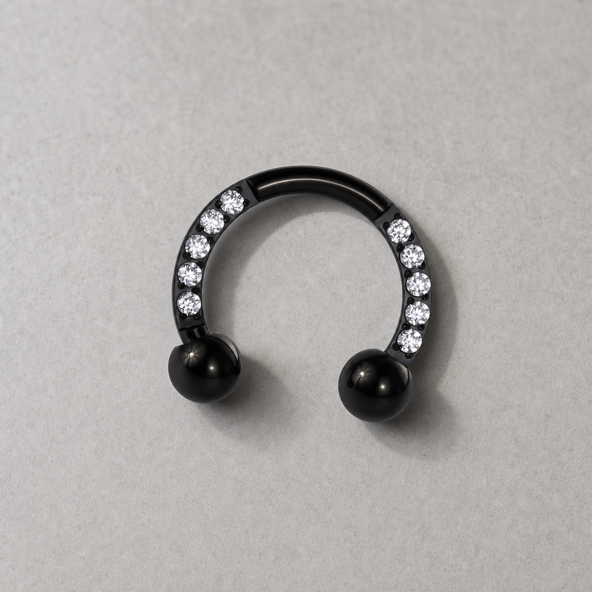 [TOPOSH-LEGACY-LAYOUT-REPAIR-20260717-LEGACY19:TP-HS-EX-BK-16G8-B3-B3-CLCZ-022:06] Clear CZ Titanium Horseshoe Ring – Black | 06_accessory_flatlay