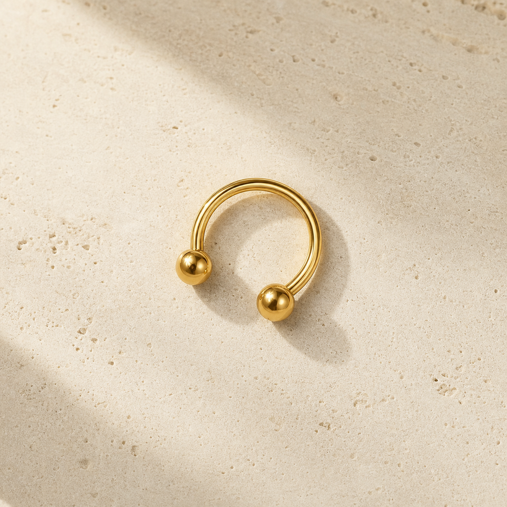 [TOPOSH-LEGACY-LAYOUT-REPAIR-20260717-LEGACY19:TP-HS-EX-GD-16G8-B3-B3-PLN-285:06] Titanium Horseshoe Ring – Gold | 06_accessory_flatlay