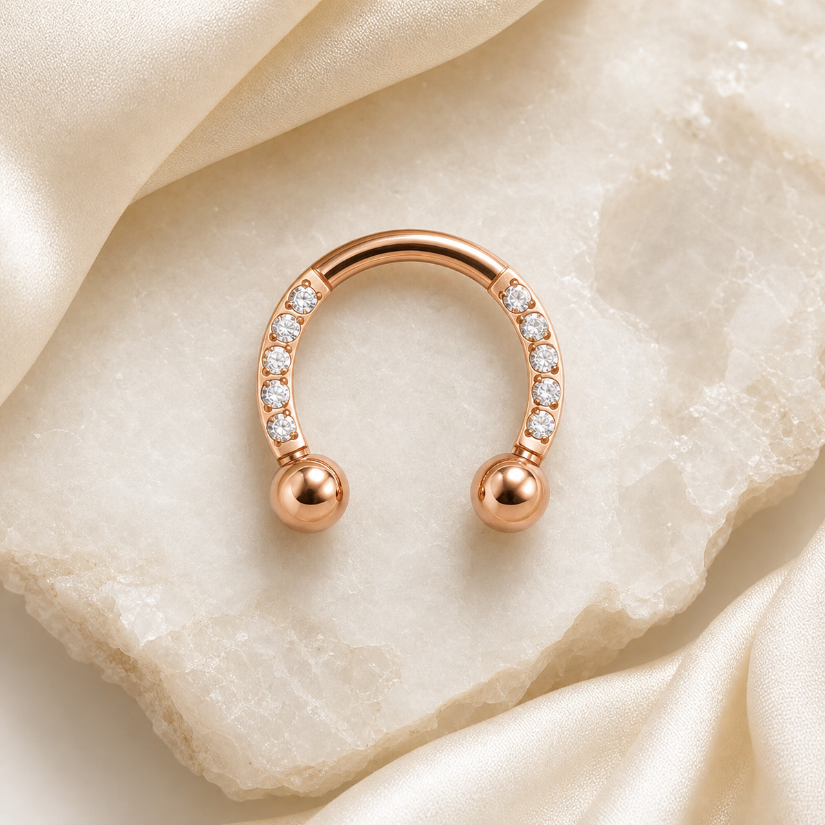 [TOPOSH-LEGACY-LAYOUT-REPAIR-20260717-LEGACY20:TP-HS-EX-RG-16G8-B3-B3-CLCZ-024:06] Clear CZ Titanium Horseshoe Ring – Rose Gold | 06_accessory_flatlay