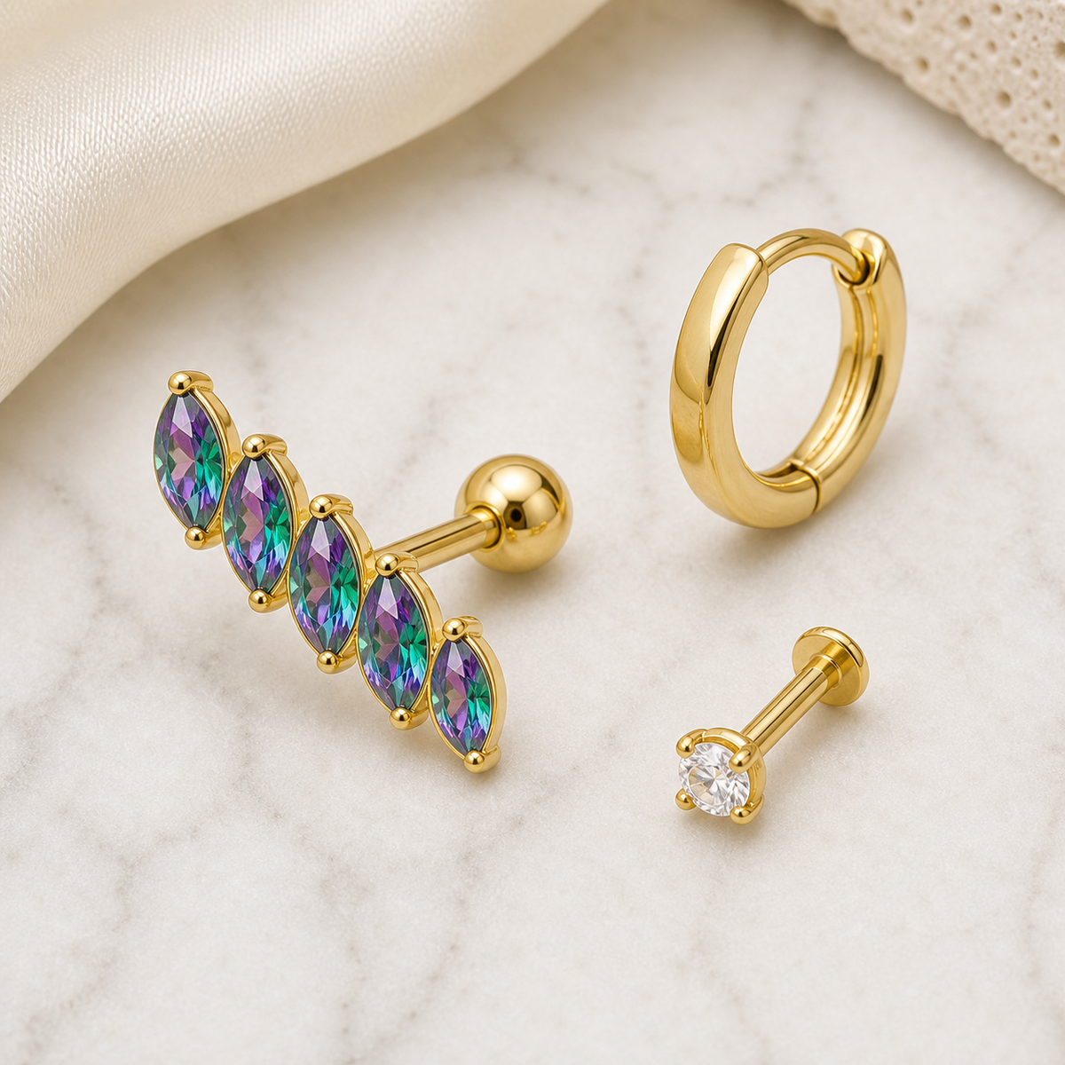 [TOPOSH-LEGACY-LAYOUT-REPAIR-20260717-LEGACY02:TP-CAR-EX-GD-16G6-T4-RBCZ-043:06] Rainbow CZ Titanium Cartilage Barbell – Gold | 06_accessory_flatlay