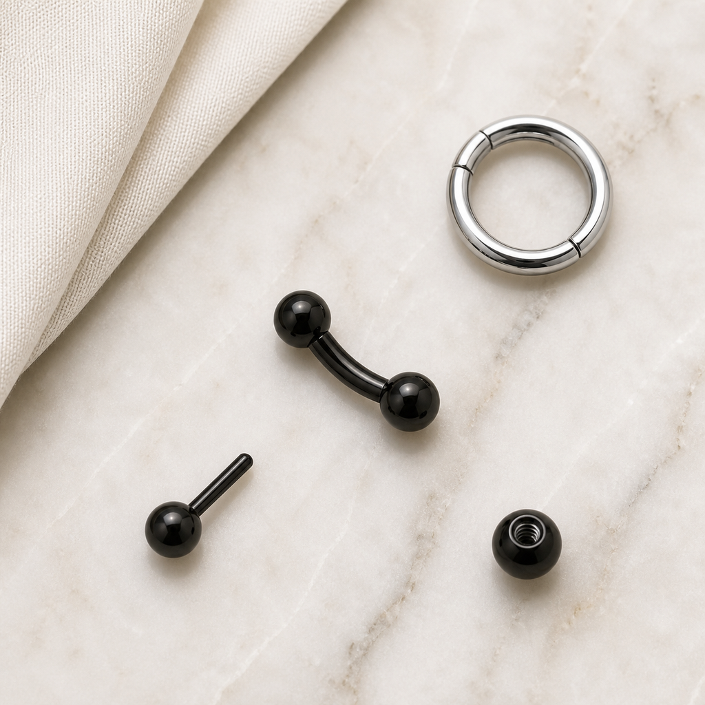 [TOPOSH-ROLE-ORDER-CLEANUP-20260717-BATCH16:TP-EBR-EX-BK-16G6-B3-B3-PLN-564:06] Titanium Eyebrow Barbell – Black, 6+3+3mm | 06_accessory_flatlay