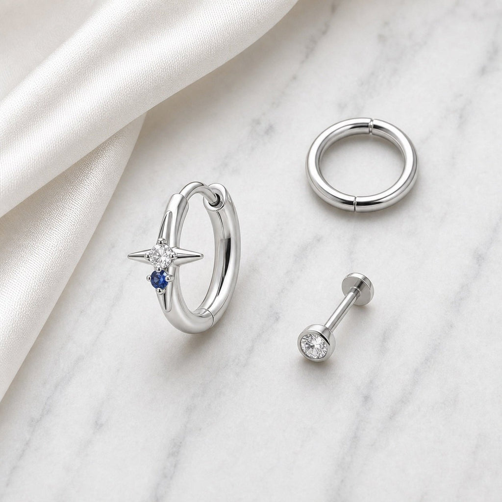 [TOPOSH-ROLE-ORDER-CLEANUP-20260717-BATCH17:TP-ER-SIL-20G8-CLCZ+NBL-032:06] Clear & Navy CZ Titanium Earring – Silver | 06_accessory_flatlay