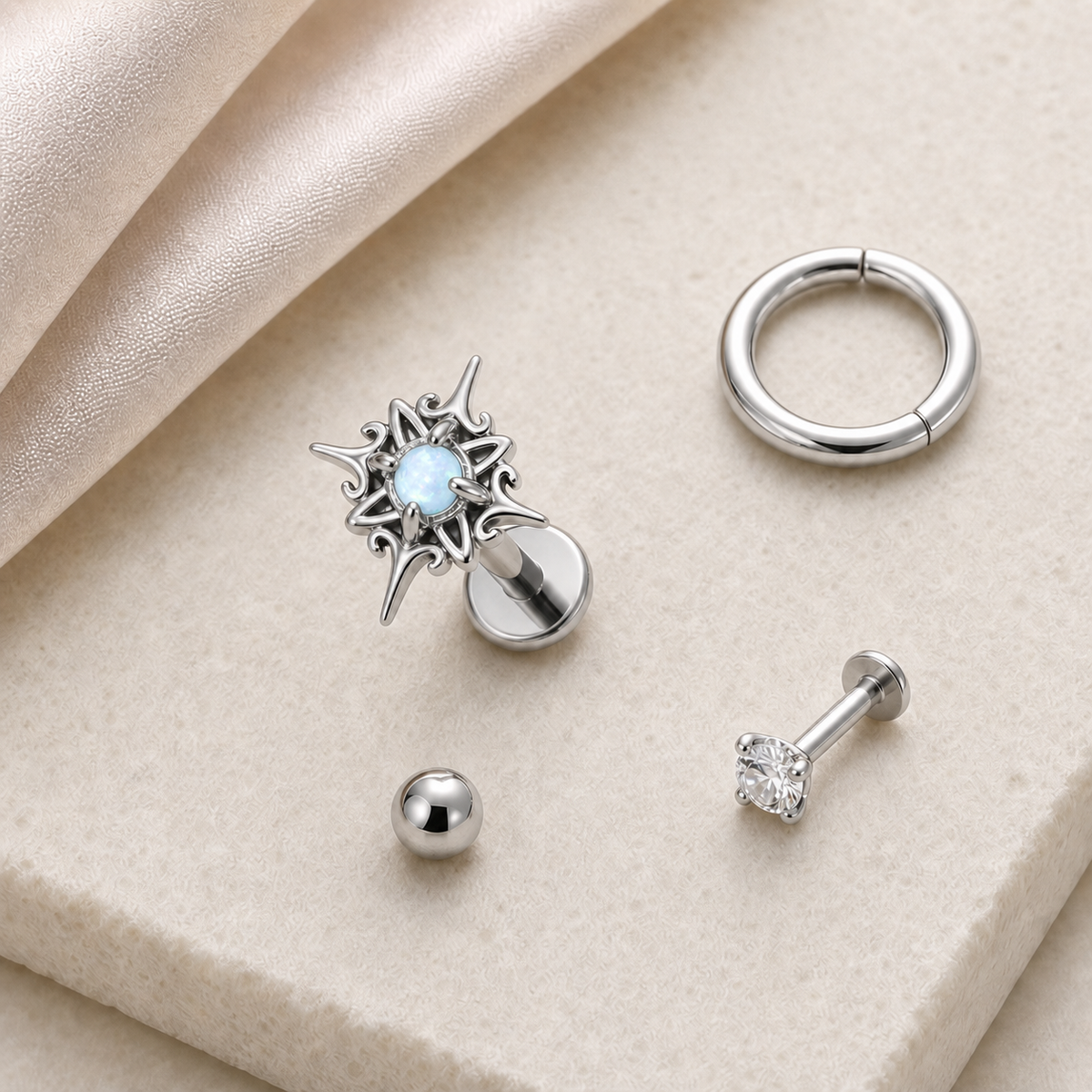 [TOPOSH-LEGACY-LAYOUT-REPAIR-20260717-LEGACY09:TP-FB-IN-SIL-16G6-T4-LBL-079:06] Sunburst Light Blue Titanium Flat Back – Silver | 06_accessory_flatlay