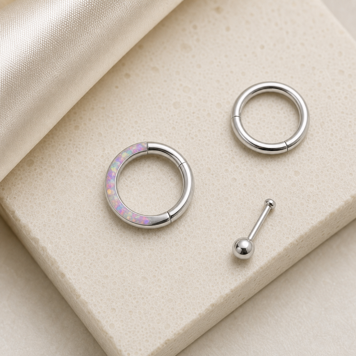 [TOPOSH-ROLE-ORDER-CLEANUP-20260717-BATCH21:TP-SR-CB-SIL-16G8-OP10-012:06] Pink Opal Titanium Segment Ring – Silver | 06_accessory_flatlay