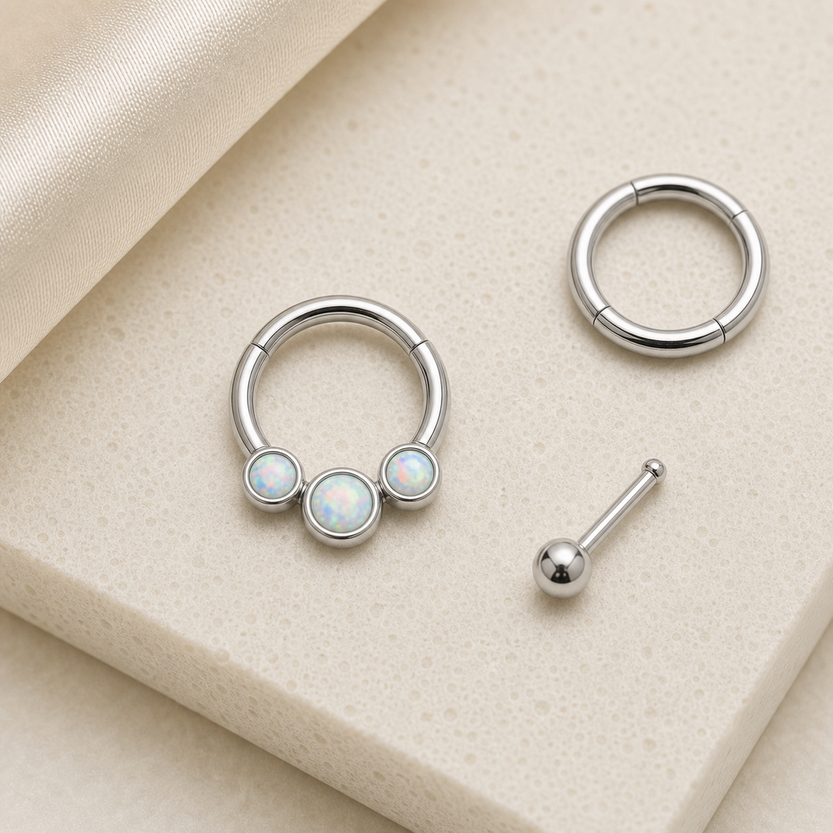 [TOPOSH-ROLE-ORDER-CLEANUP-20260717-BATCH24:TP-SR-CB-SIL-16G8-OP17-004:06] Triple White Opal Titanium Segment Ring – Silver | 06_accessory_flatlay